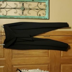 Ladies black dress pants with front tie belt, elastic waist, very roomy.